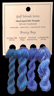 L to R: 20/2 Spun in Dragonfly #18, 6 Strand Floss in Morning Glory, Fine Cord in Lapis Lazuli #6, 8/2 Reeled in Bachelor's Button #7