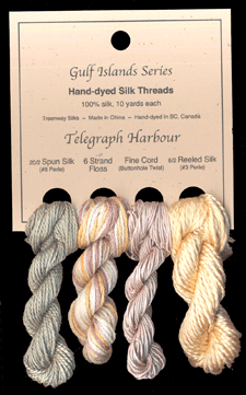 L to R: 20/2 Spun in Eucalyptus #215, 6 Strand Floss in Antique Silk, Fine Cord in Sand Dune #9517, 8/2 Reeled in Narcissus #38