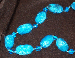Detail of silk cocoon necklace by Marie Seabrook