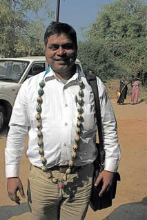 Hansraj with tasar cocoons