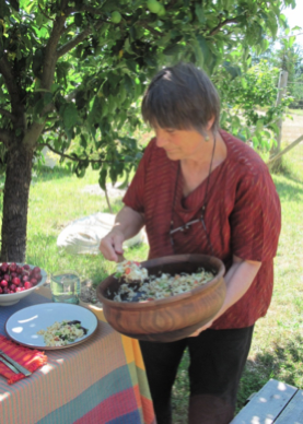 Karen feeding the hungry workers with wonderful food from their Salt Spring Island home garden