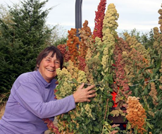 Karen with grain grown in their garden